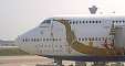 Thai Airways a décoré les avions avec des barges dessinées sur le fuselage.
